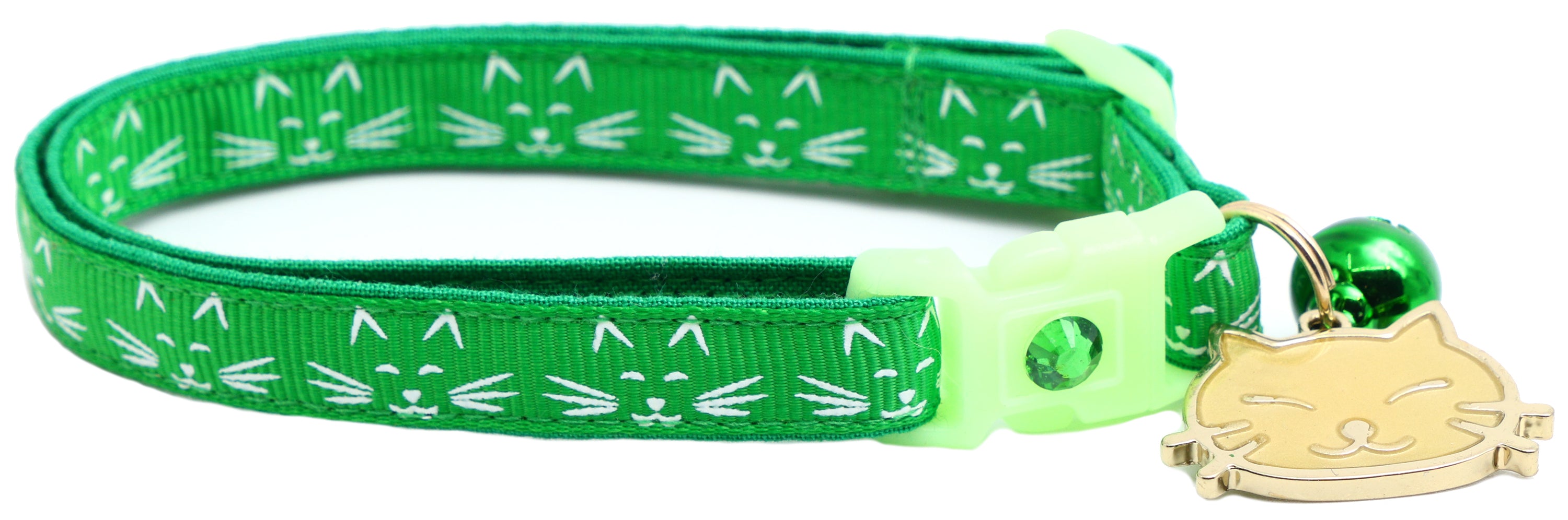 A glowing cat faces breakaway collar made of reinforced cotton, featuring a bell and charm, perfect for nighttime visibility.